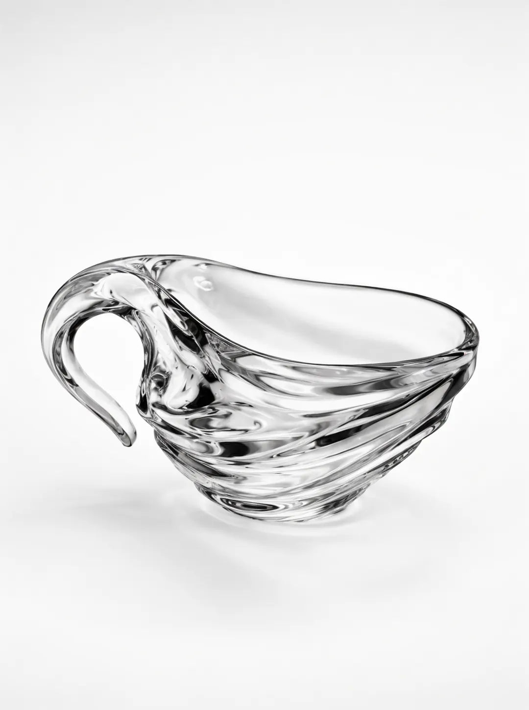 Glass cup with handle on a white background