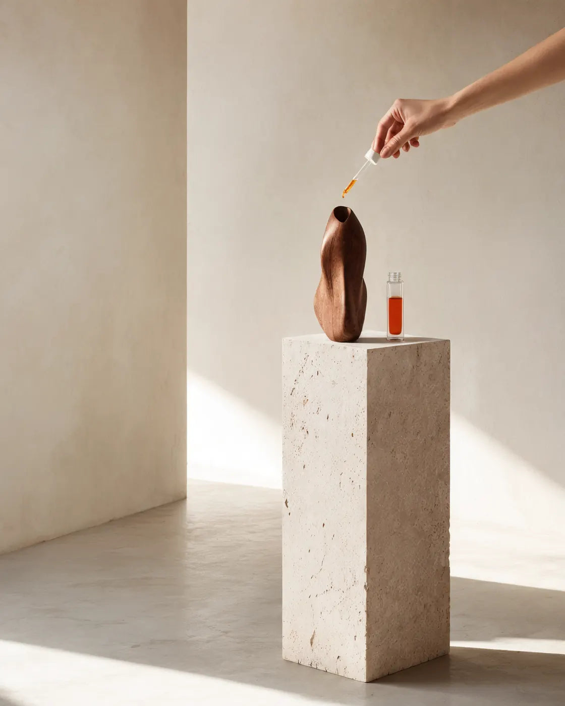 Wood bud vase and diffuser with bamboo stems in soft morning light